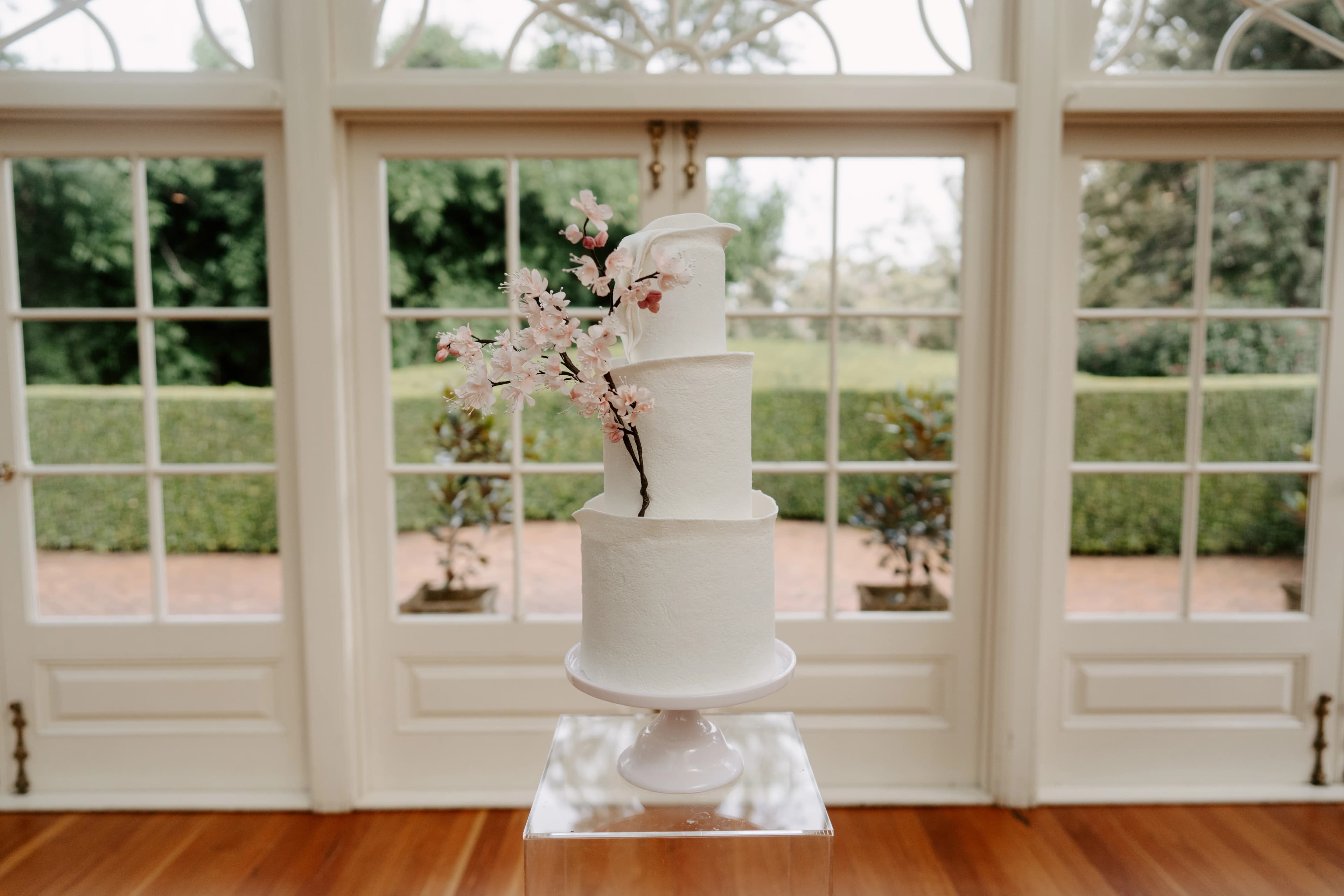 Wedding cake with cherry blossom flowers