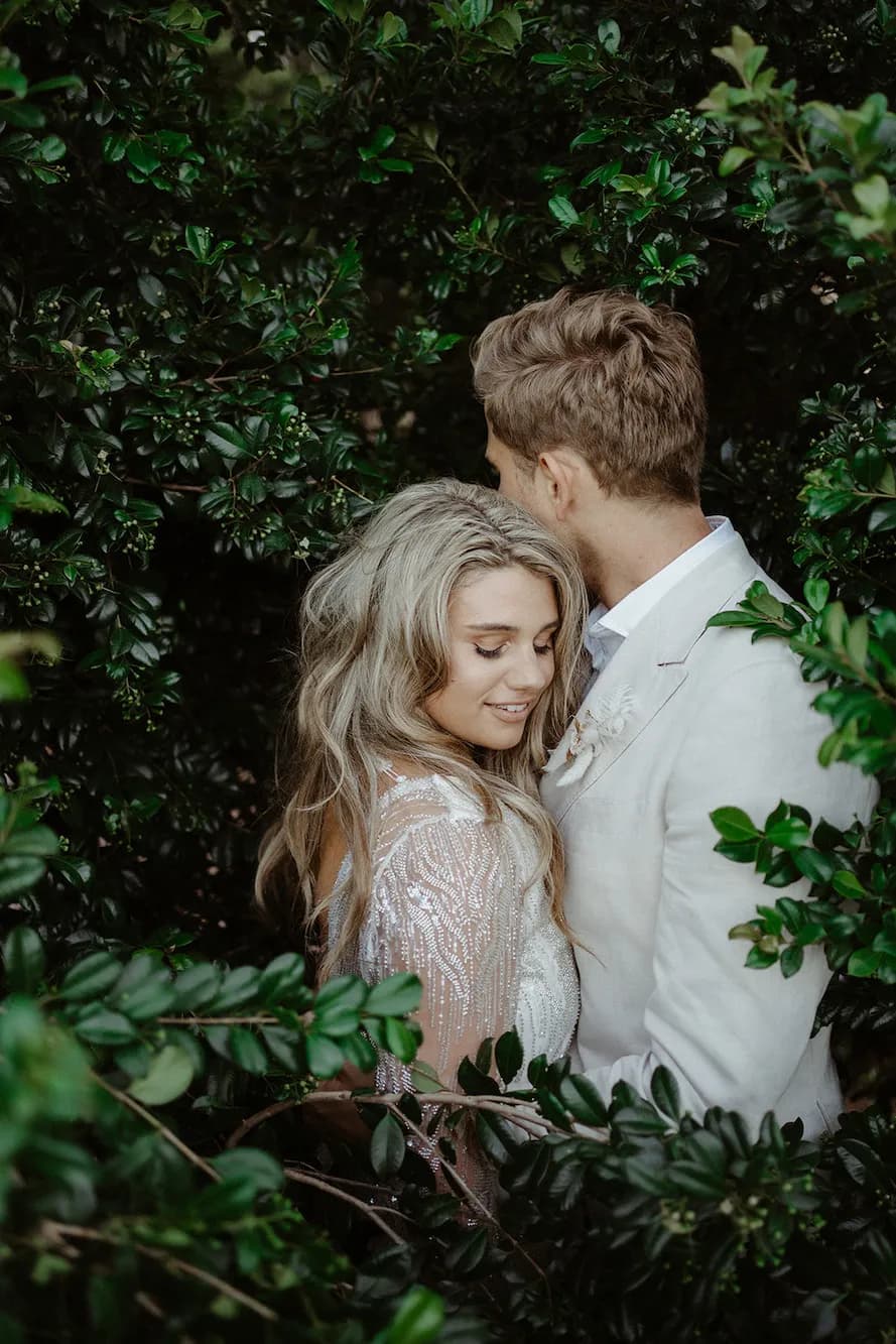 Bride and groom hugging