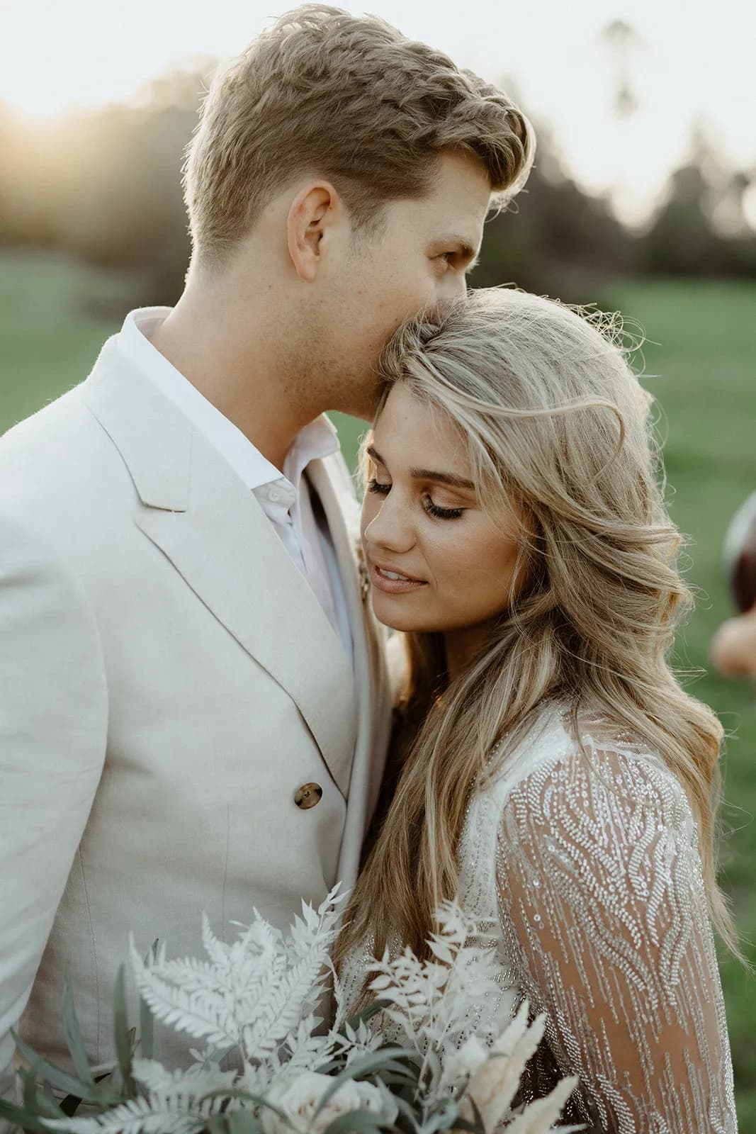 Bride and groom hugging