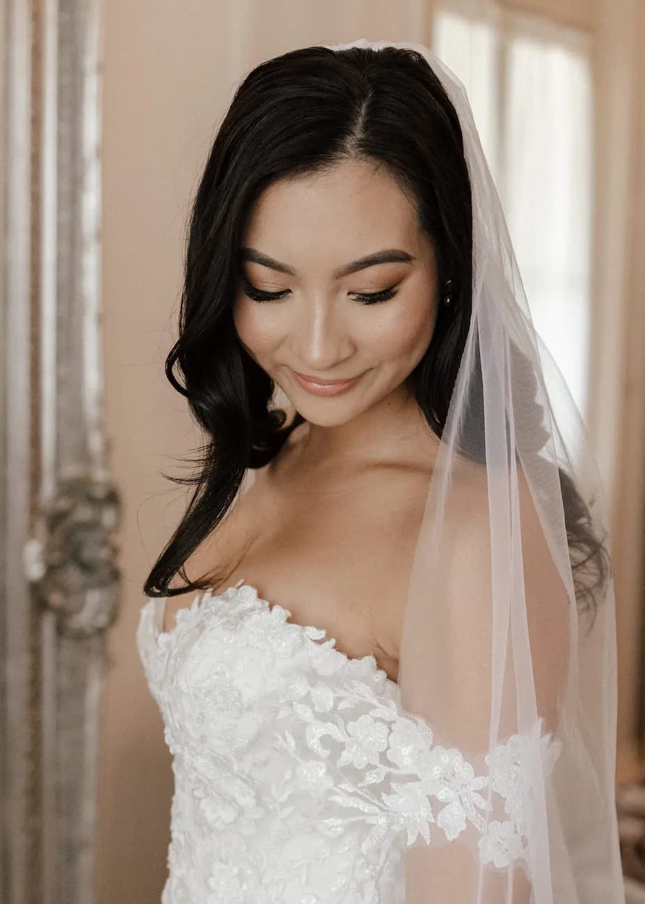 Bride smiling looking down