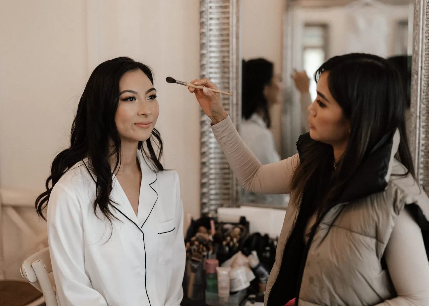 Bride getting makeup done