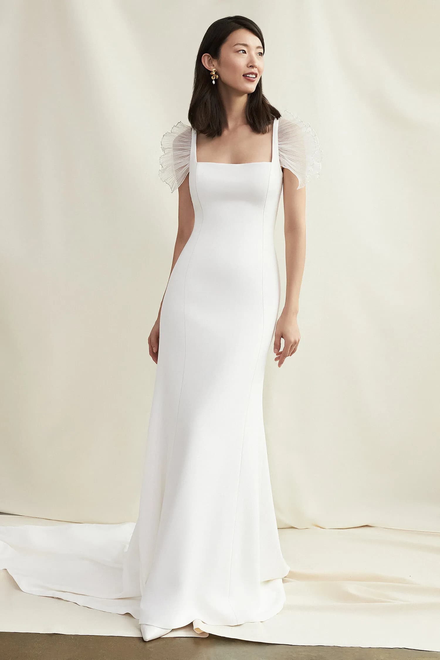 Bride wearing square neckline dress