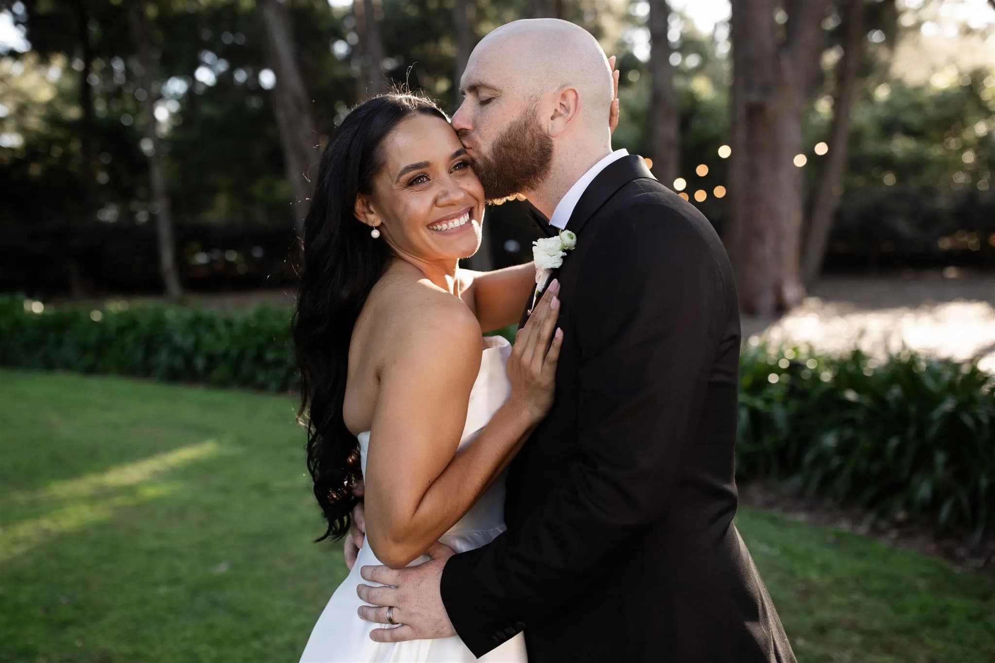 Bride and groom kissing