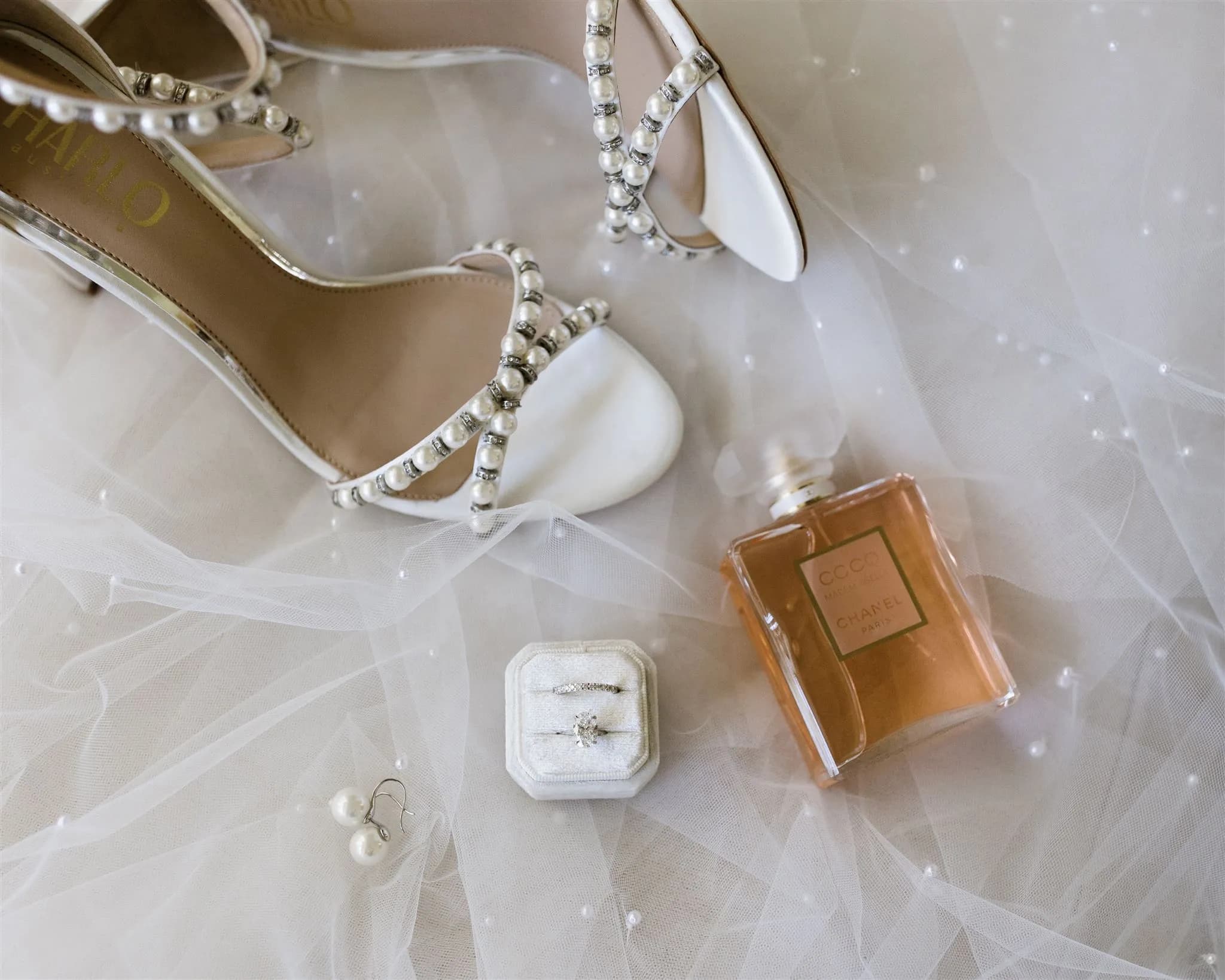 Bride shoes, rings and perfume
