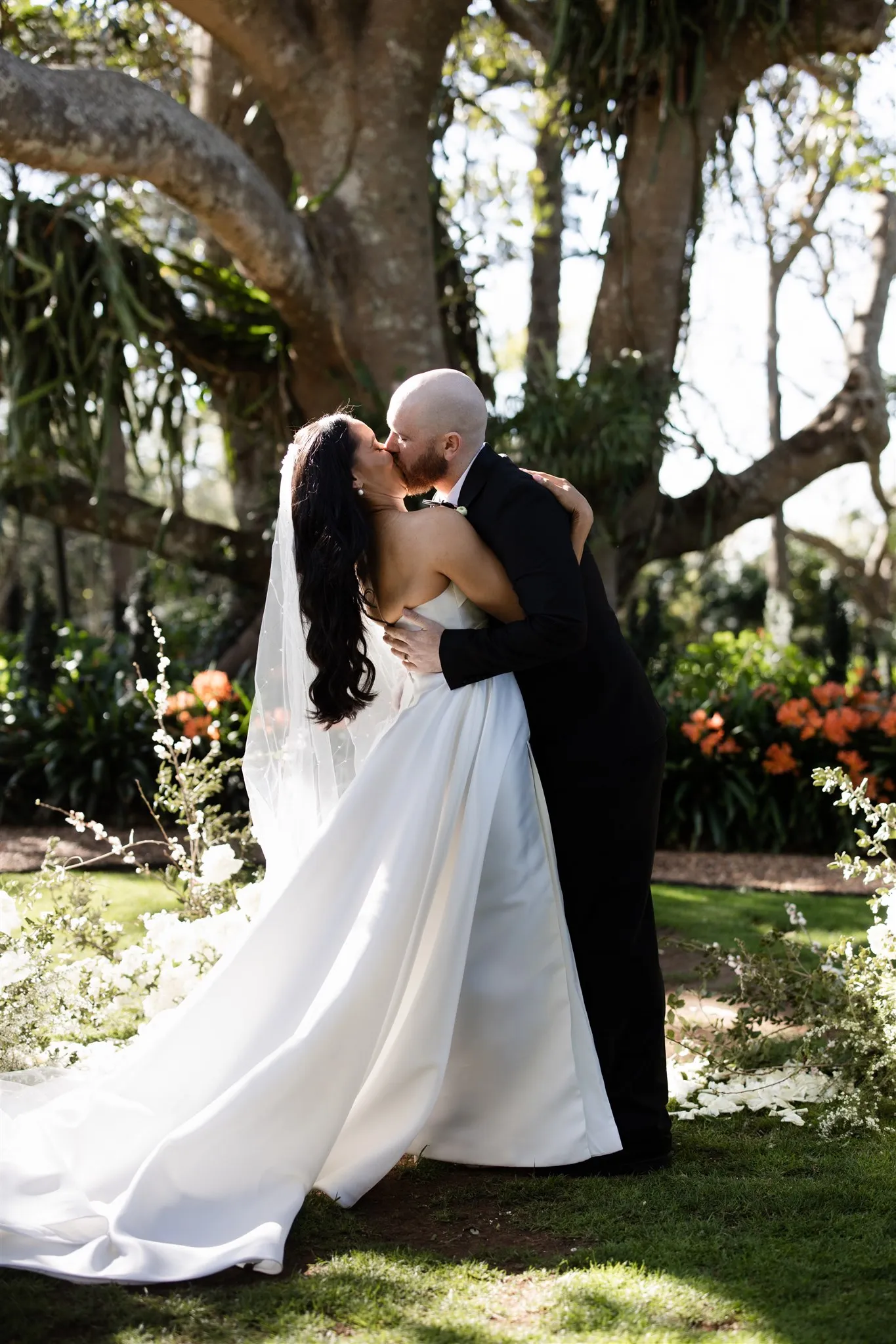 Bride and groom kissing