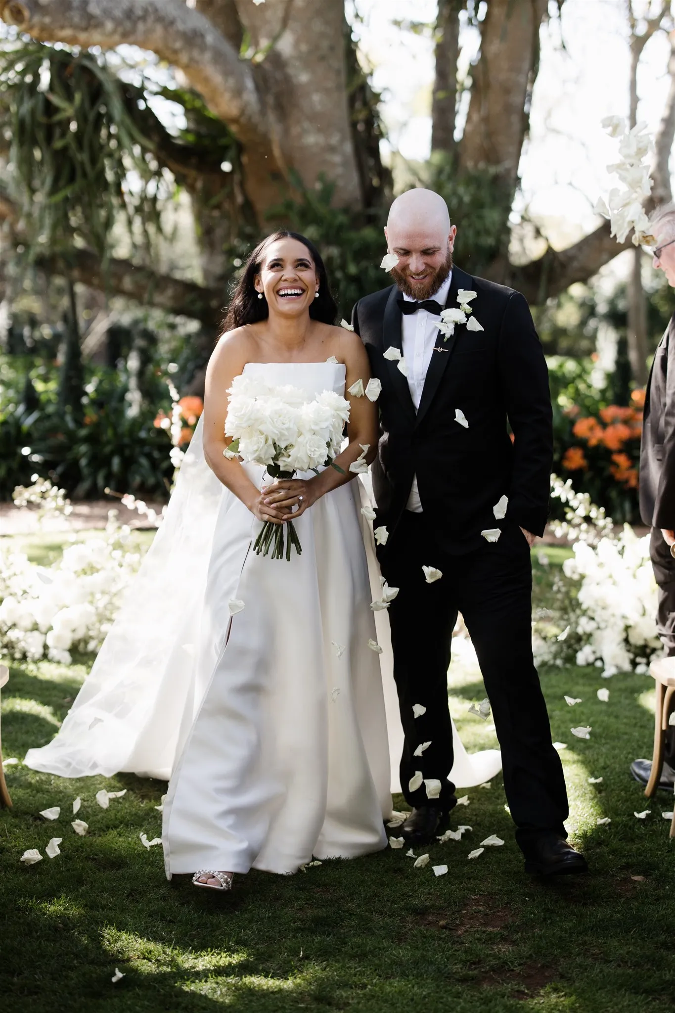 Bride and groom walking down the aisle