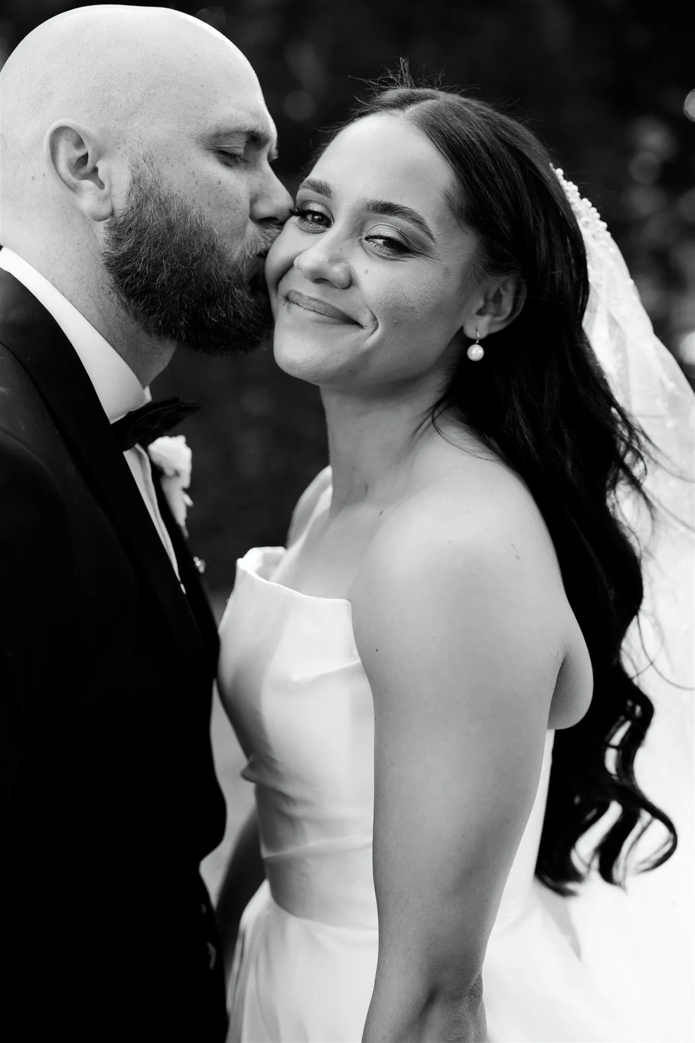 Groom kissing bride