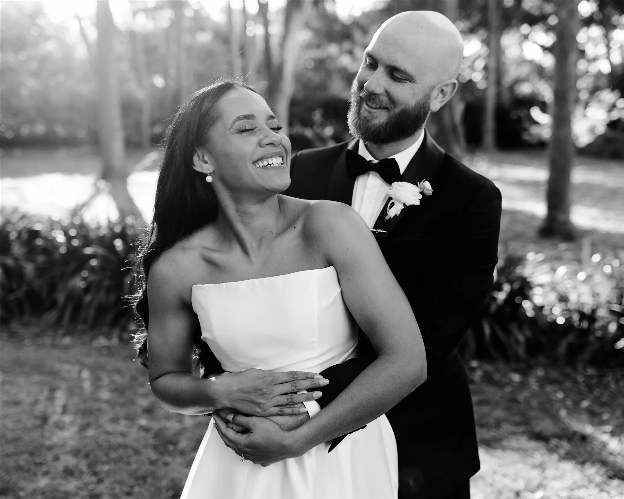 Bride and groom hugging