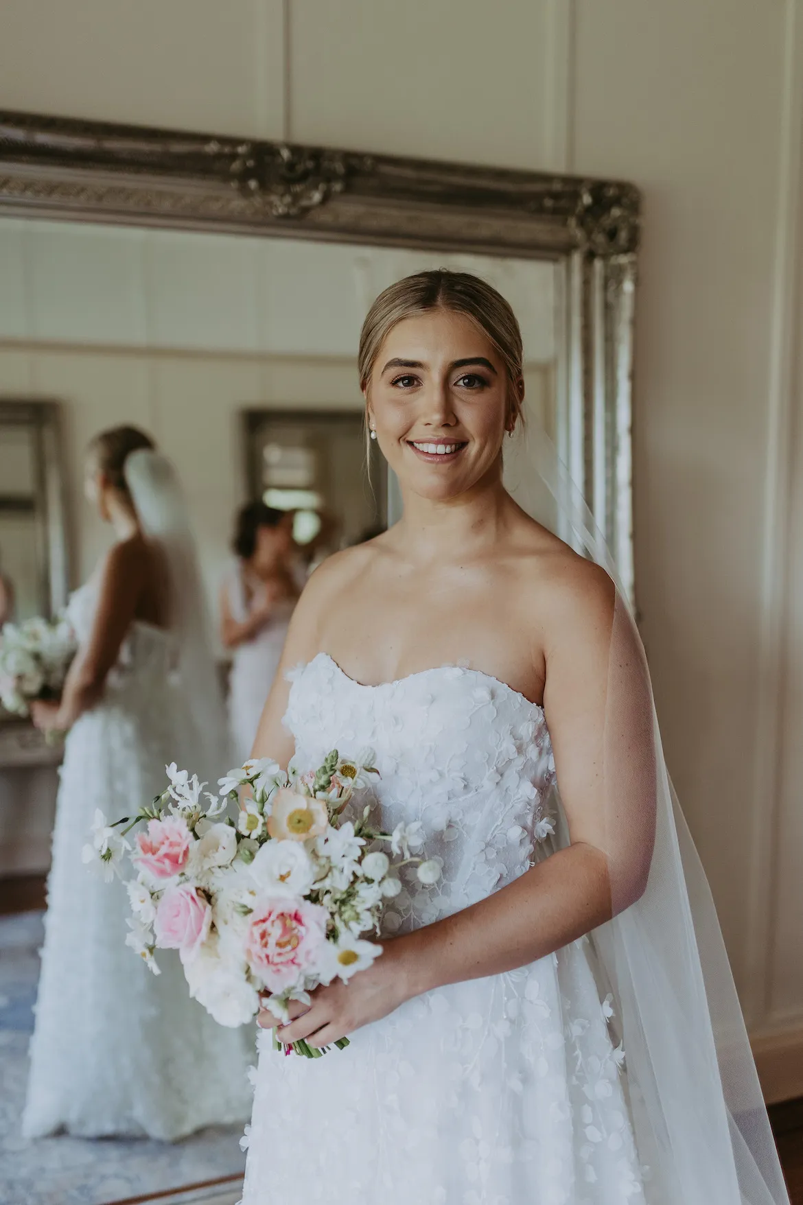 Bride holding bouquet of flowers