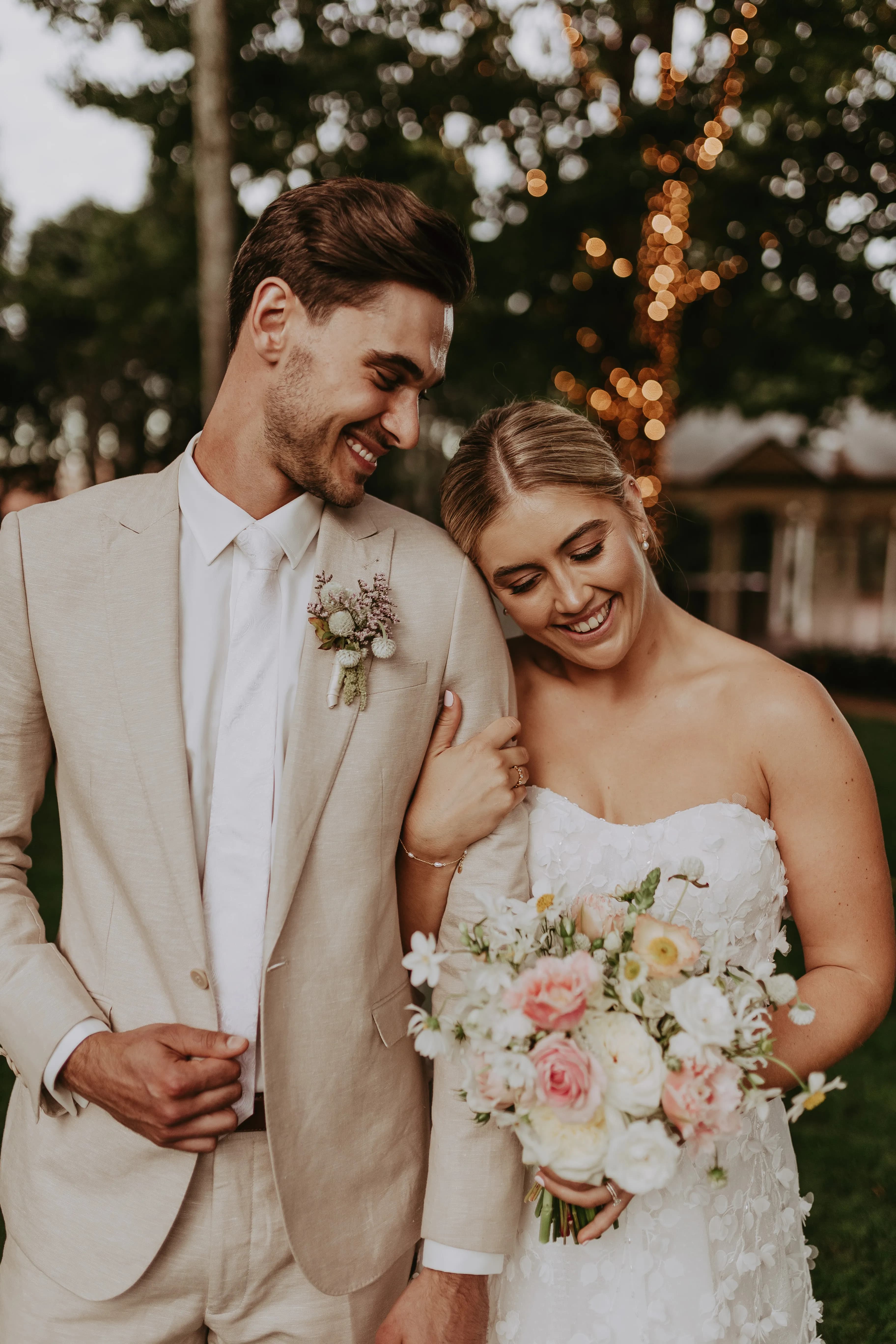 Bride and groom hugging