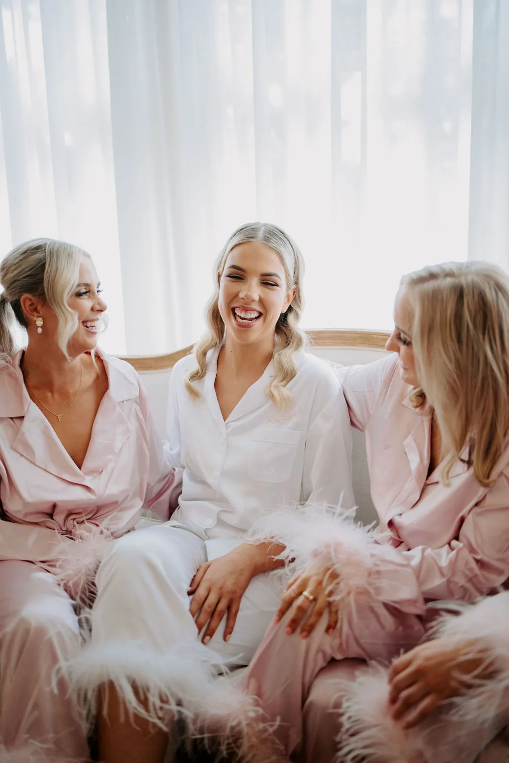 Bride and bridesmaid chatting