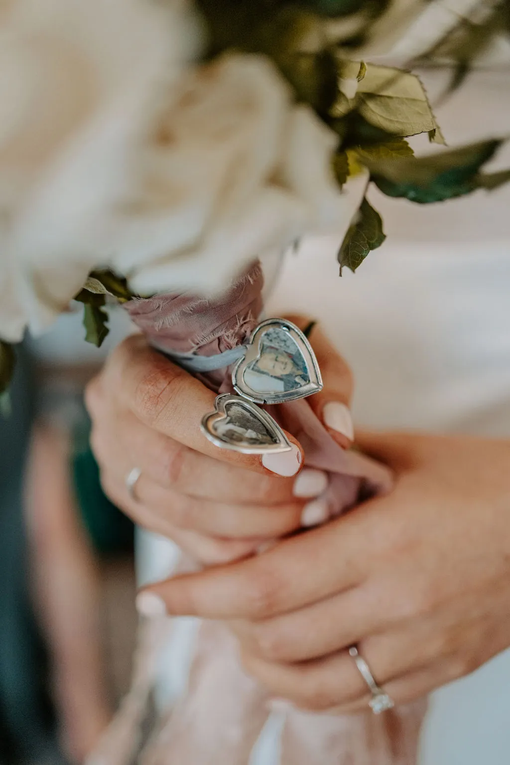 Bride holding bouquet of flowers