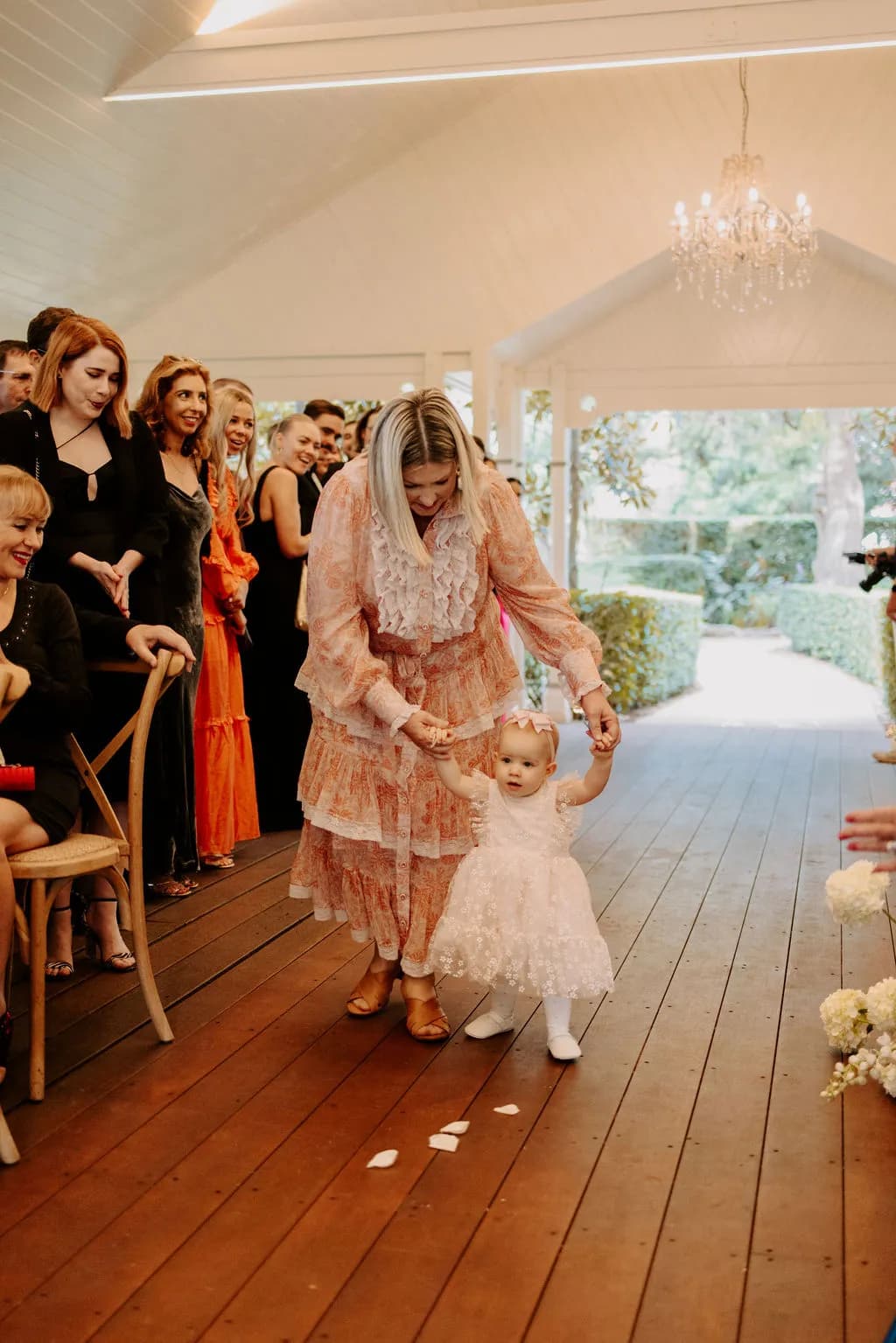 Flowergirl walking down the aisle