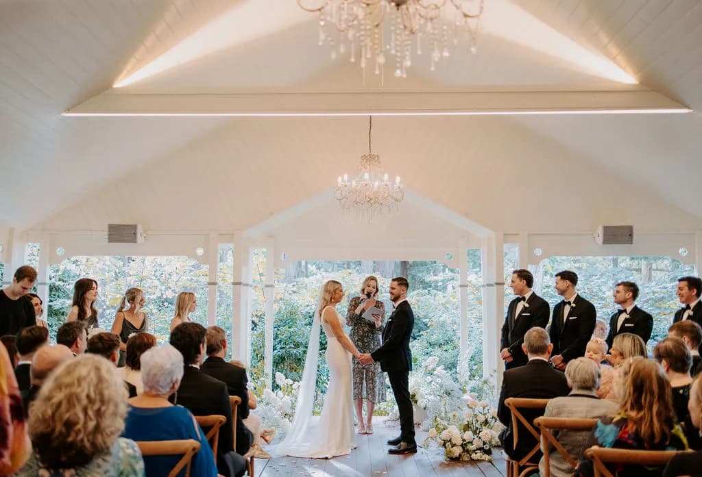 Bride and groom standing at altar