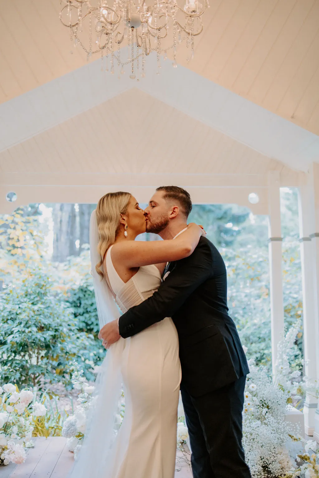 Bride and groom kissing