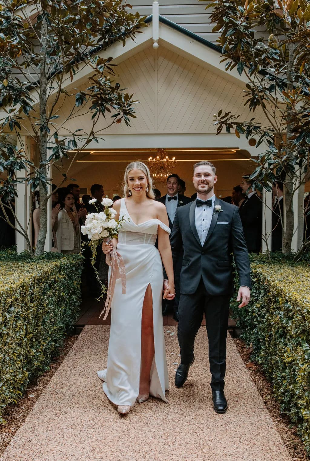 Bride and groom walking down the aisle