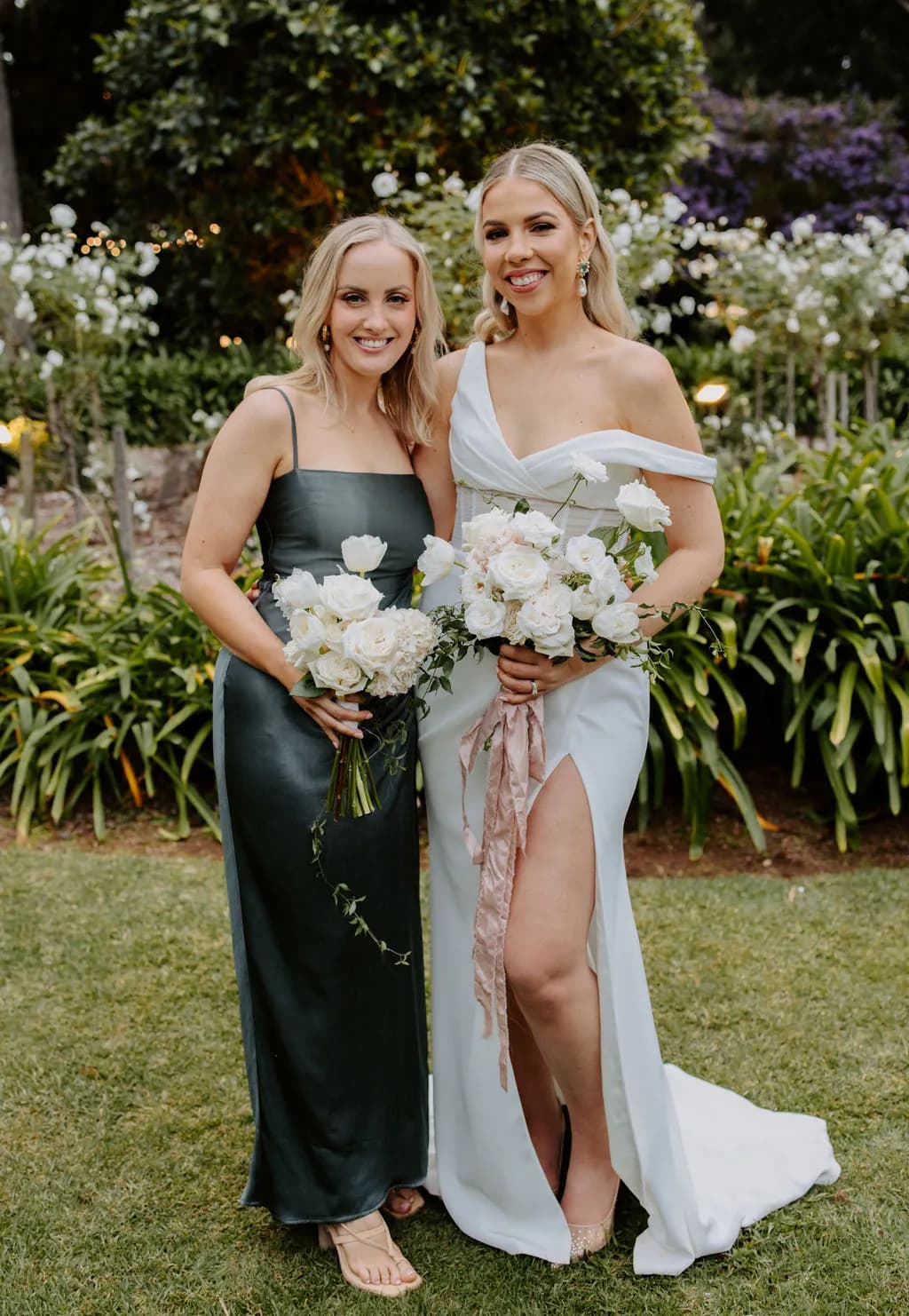 Bride and bridesmaids holding flowers