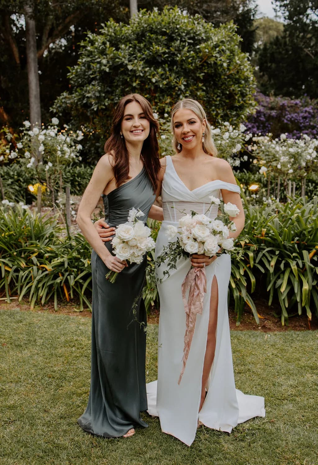 Bride and bridesmaids holding flowers