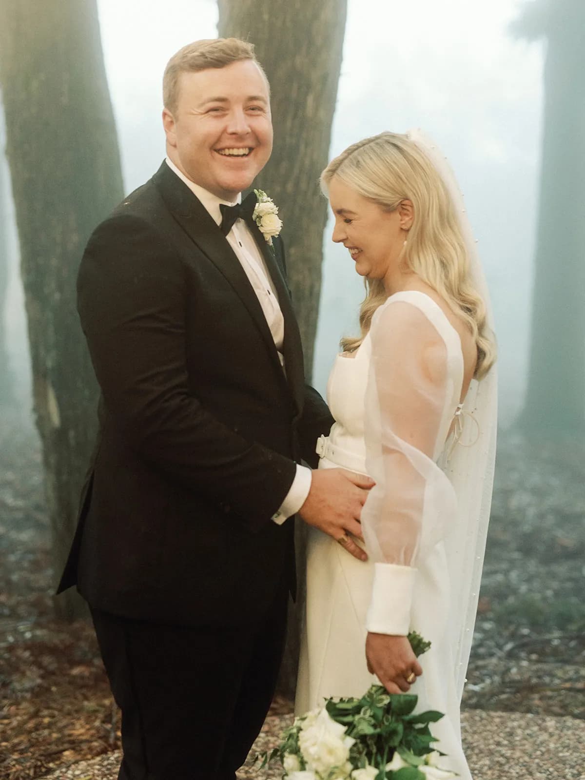 Bride and groom laughing