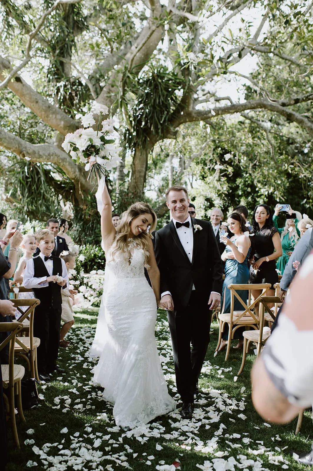 Bride and groom walking back down the aisle