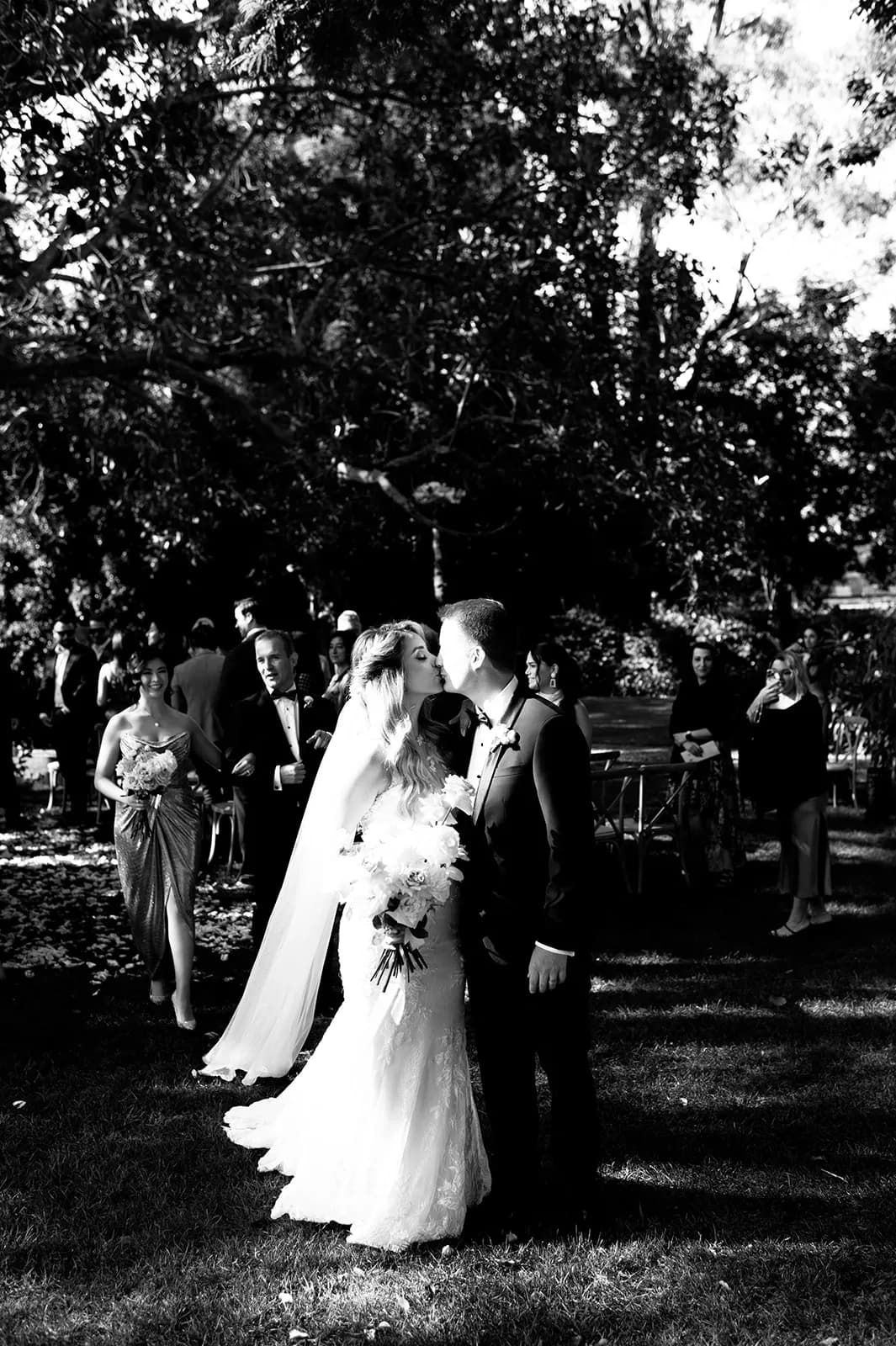 Bride and groom kissing