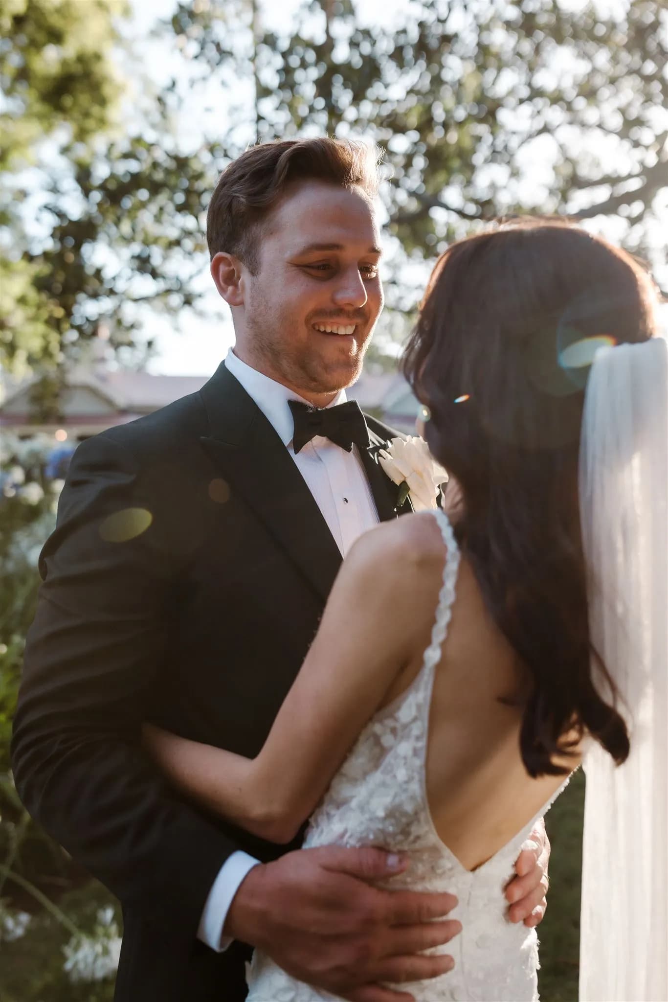 Bride and groom embracing