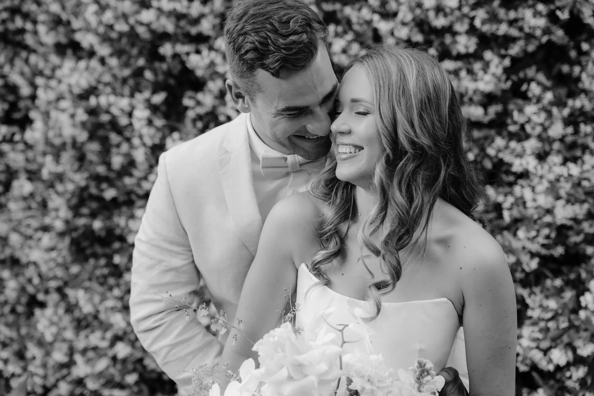 Bride and groom hugging