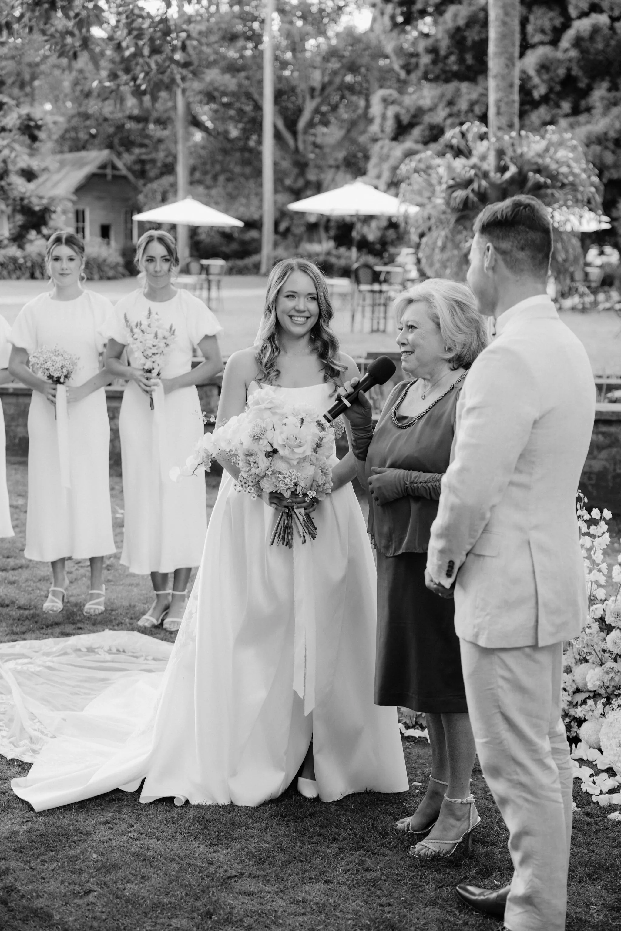 Bride and grioom standing at aisle