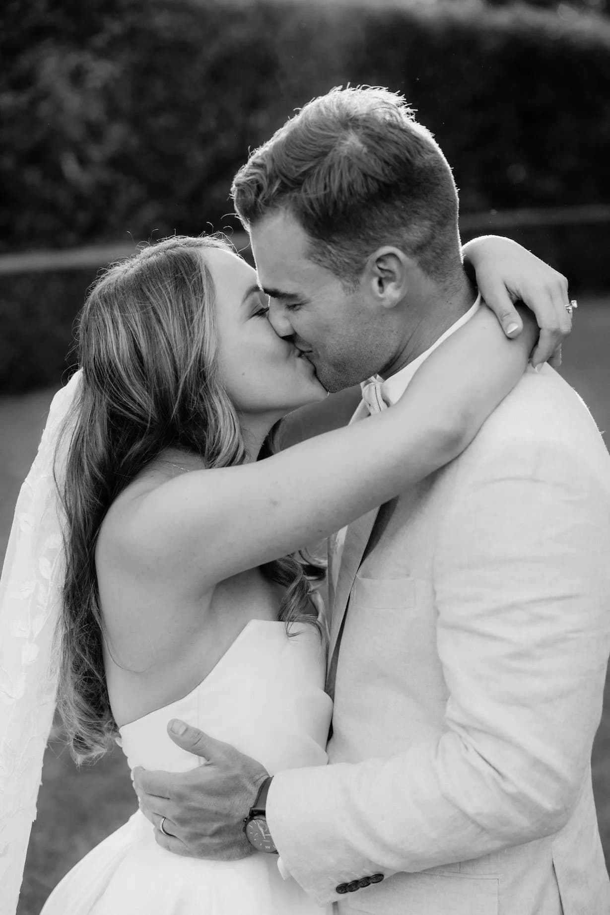 Bride and groom kissing