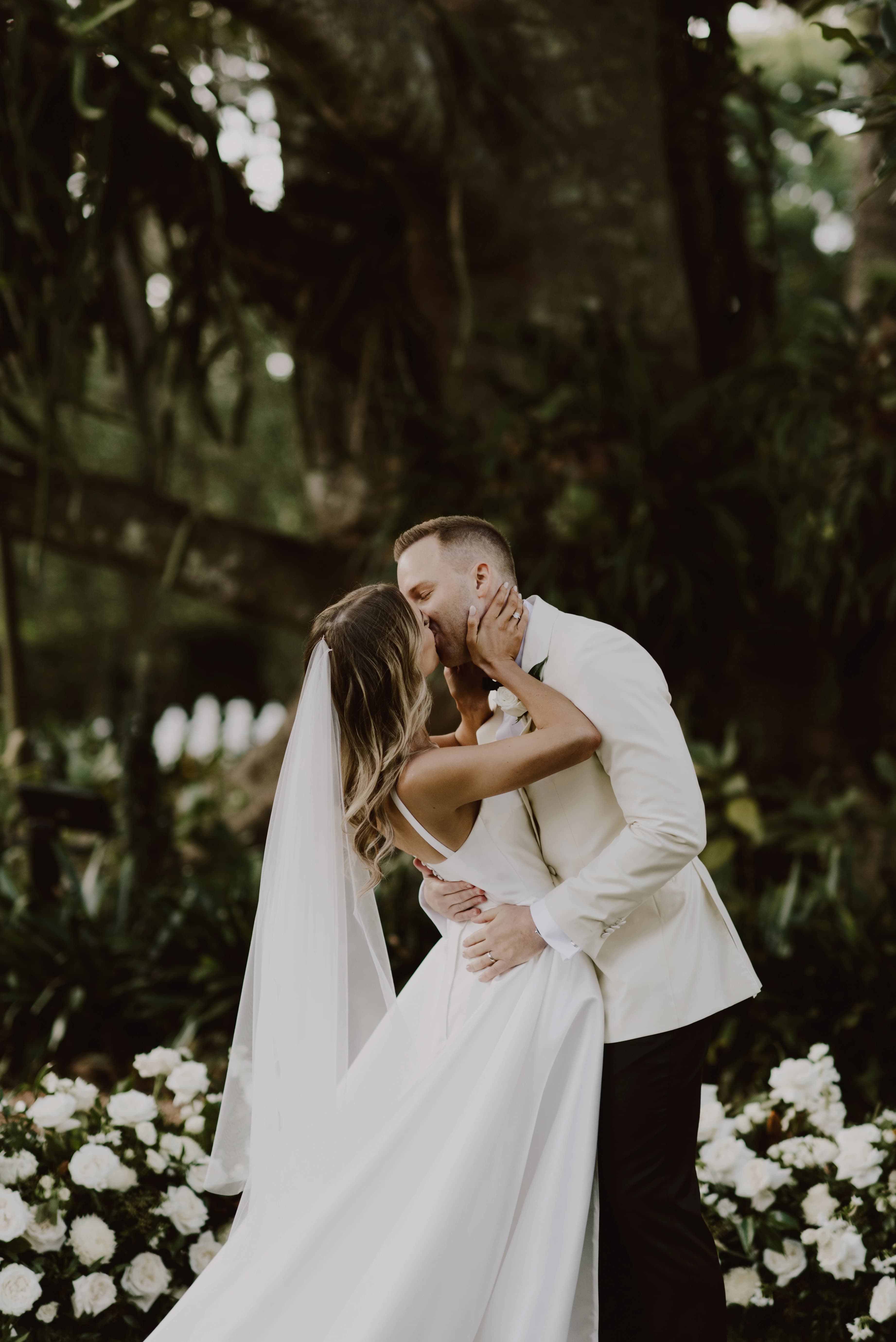 Couple kiss after saying vows