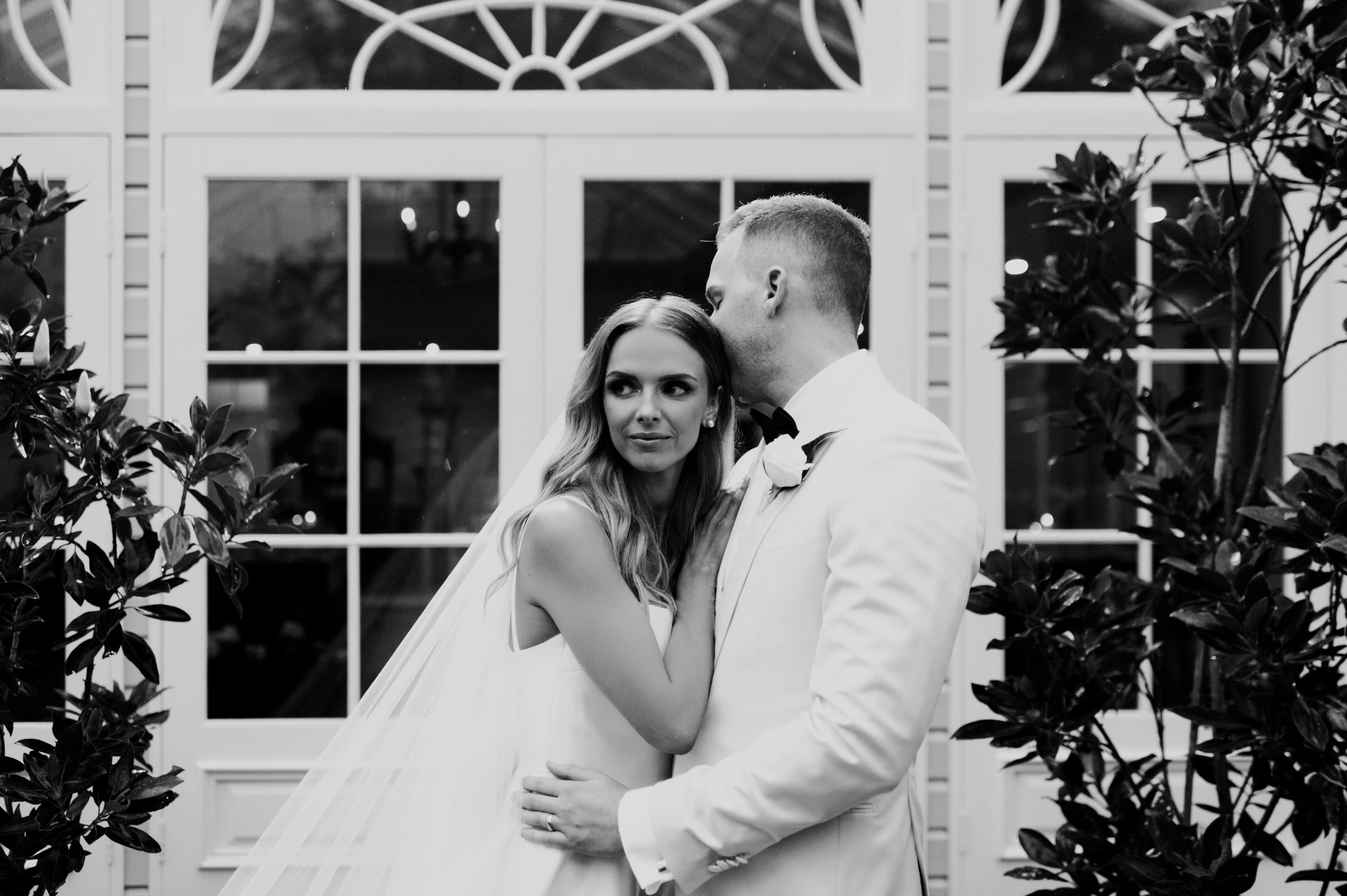 Couple embrace in black and white