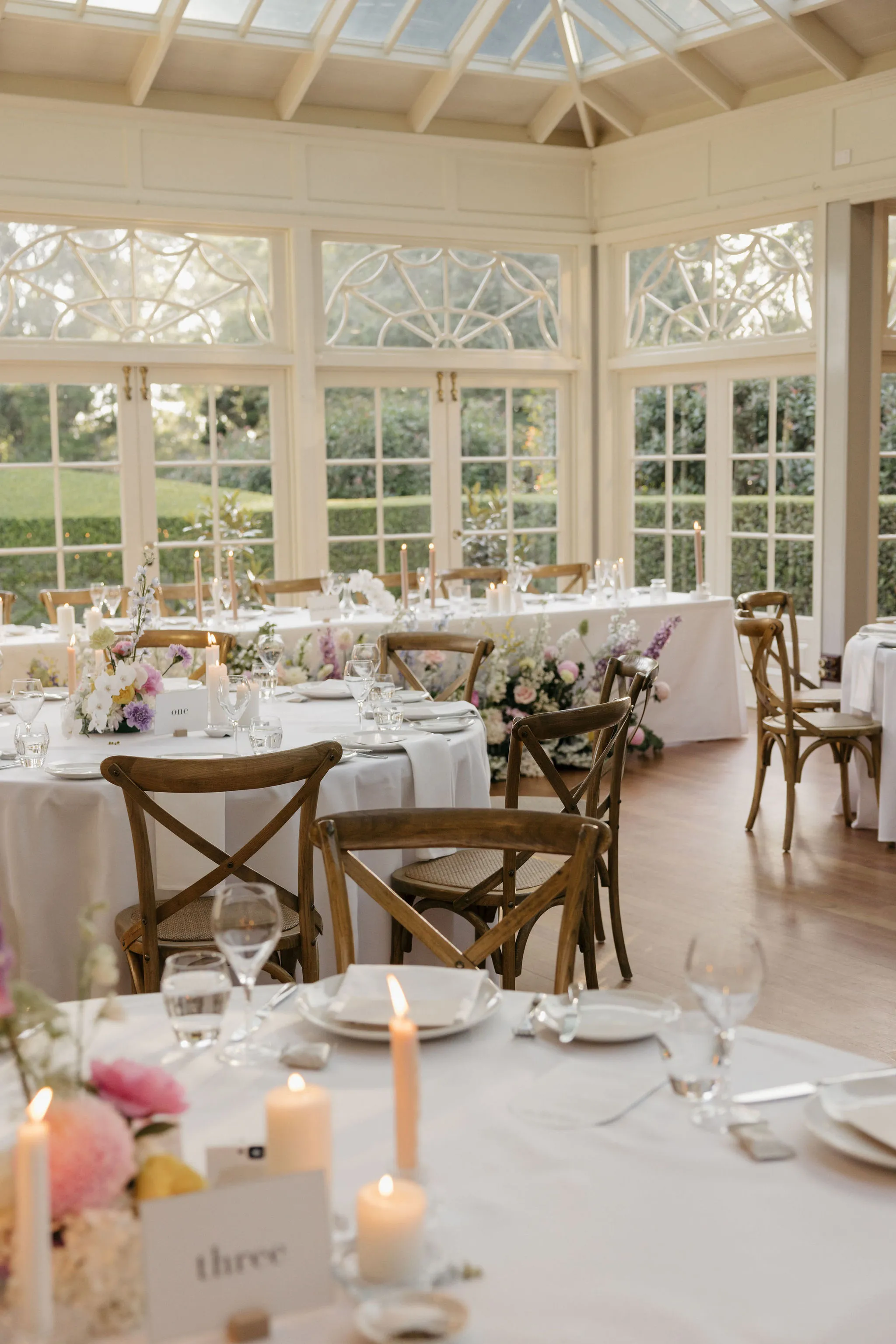 Wedding reception set with candles and flowers