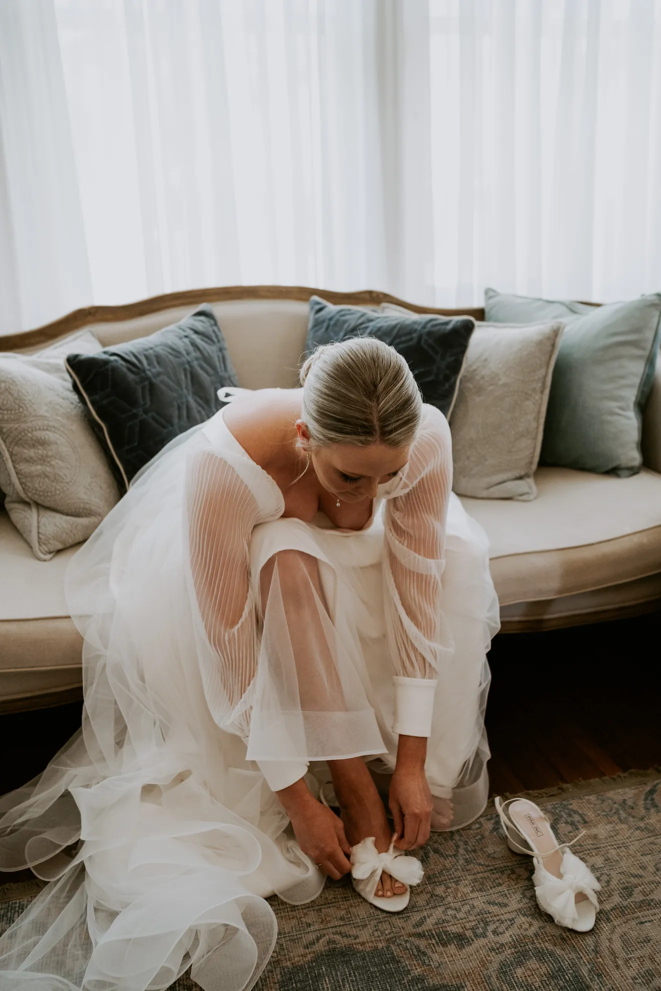 Bride putting on her shoes