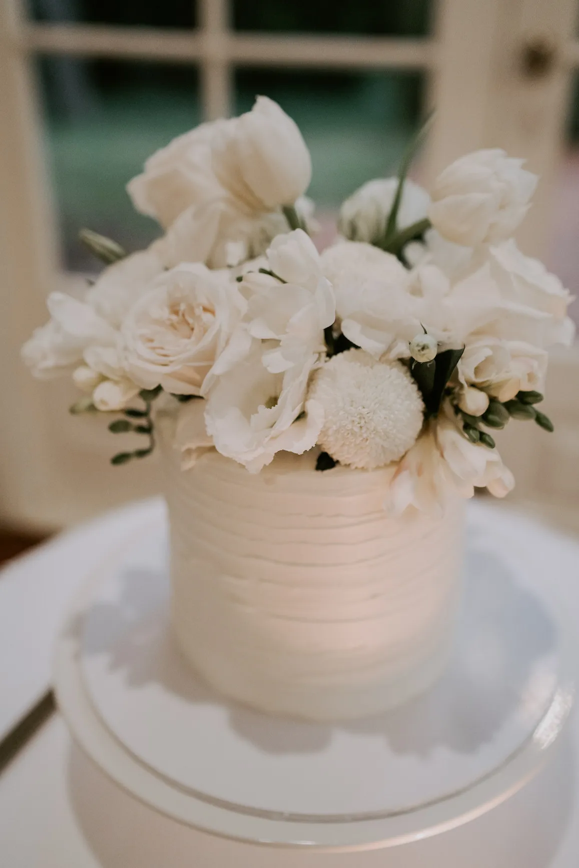 Wedding cake with flowers on top