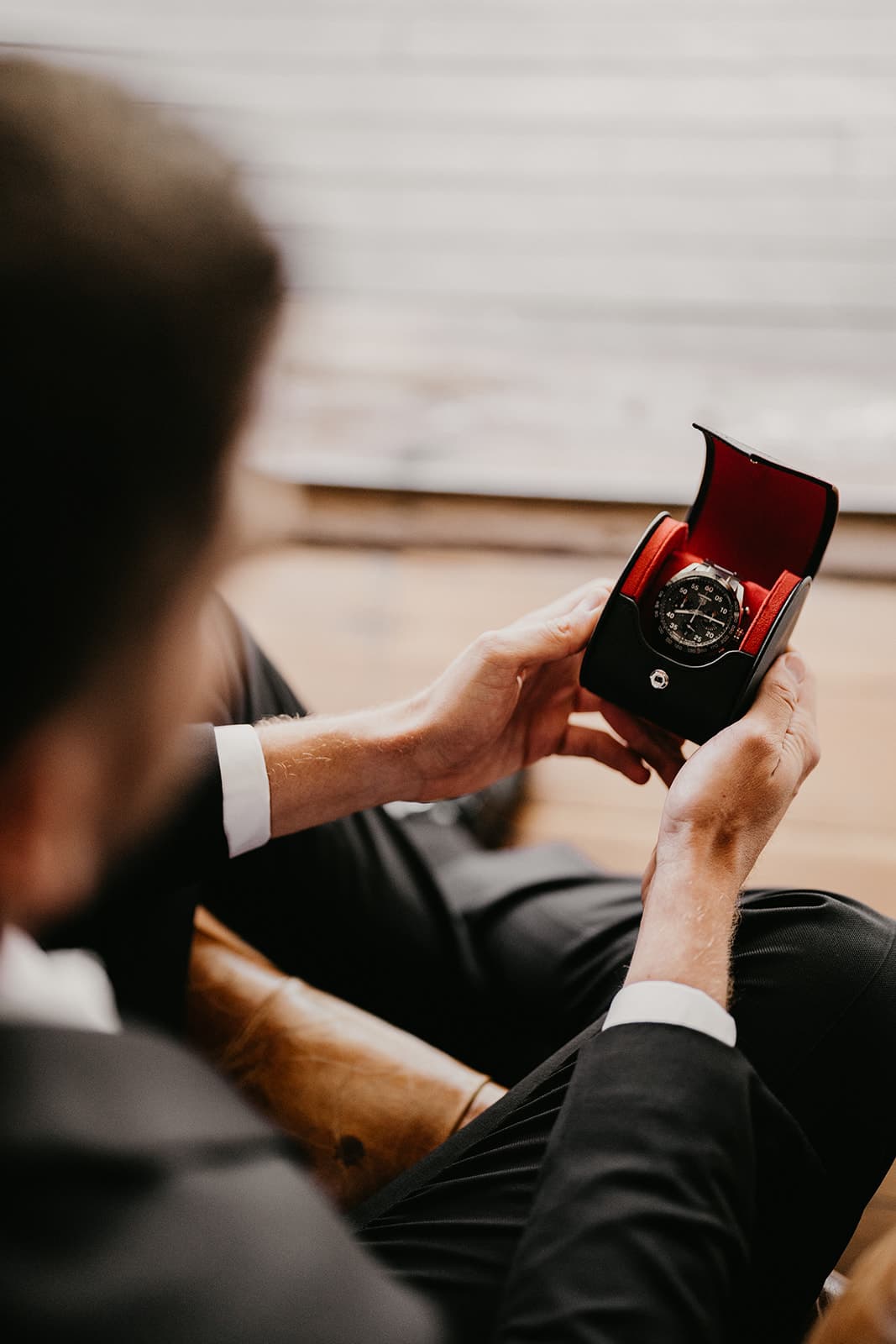 Groom looking at watch
