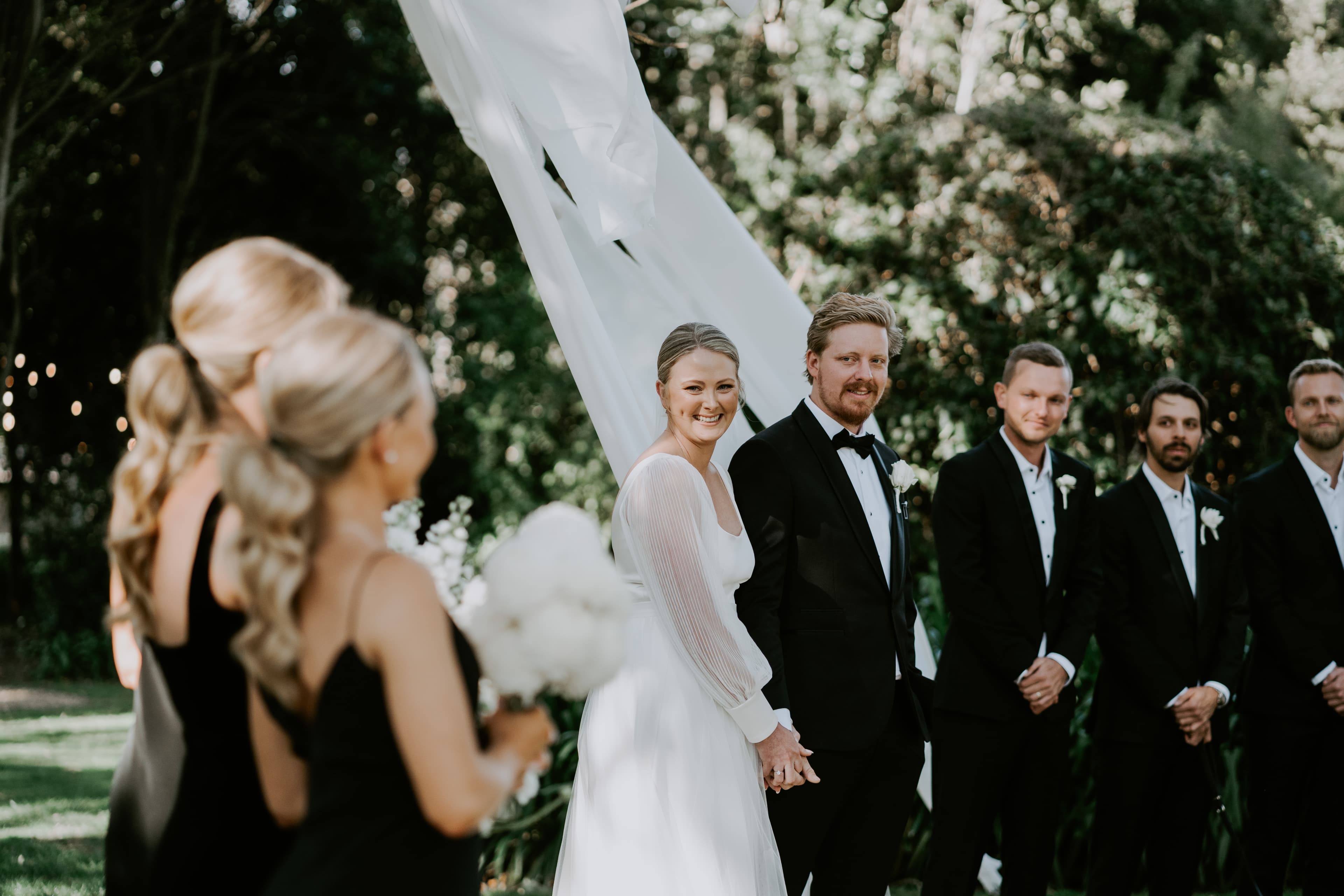 Bride and groom with wedding party