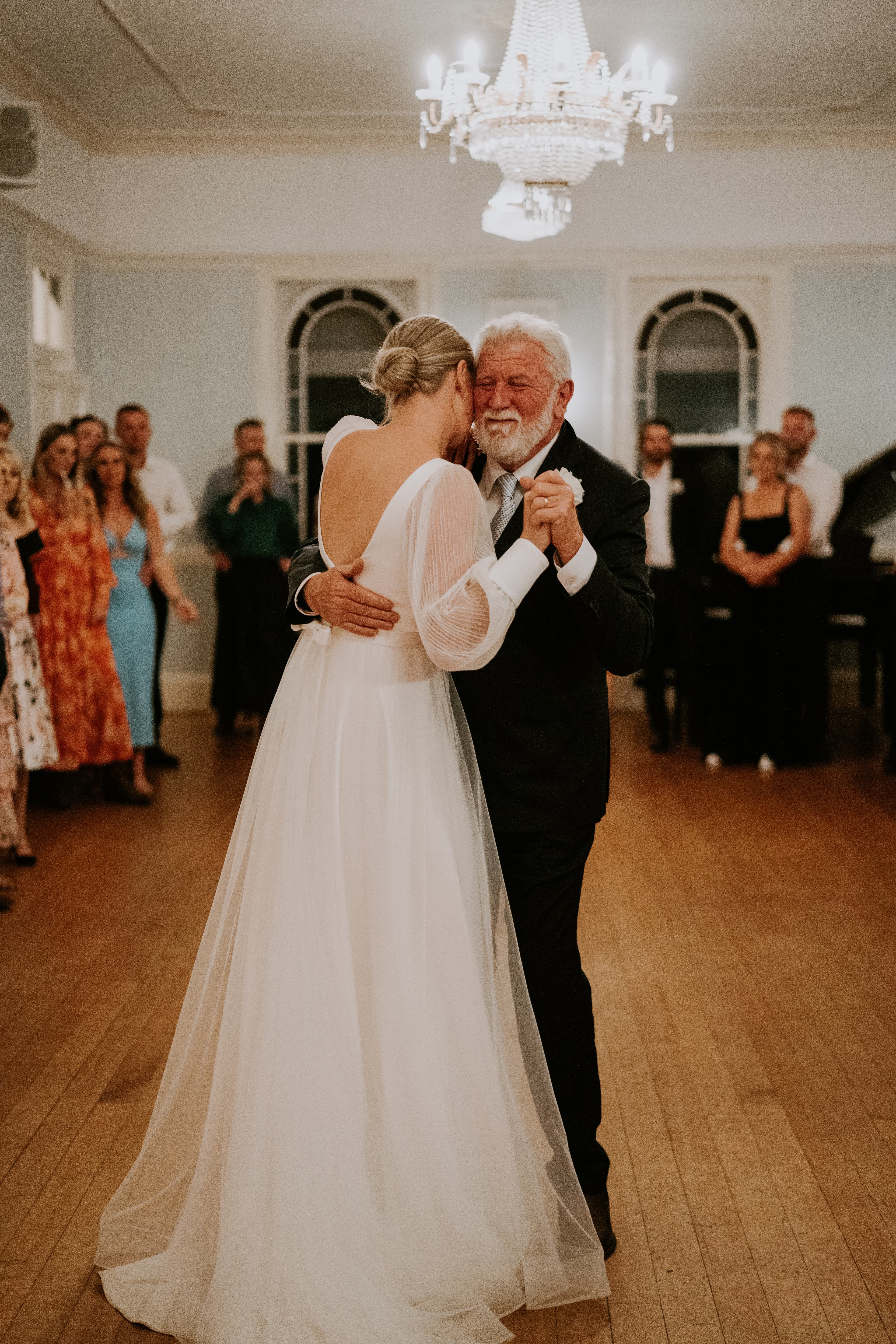 Bride dancing with father