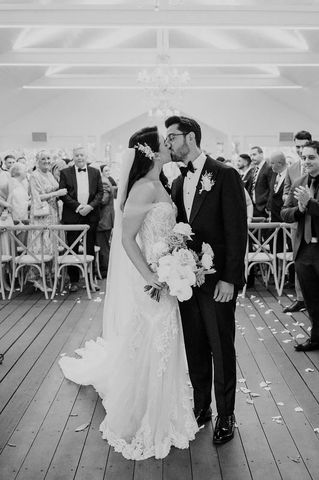 Bride and groom kissing