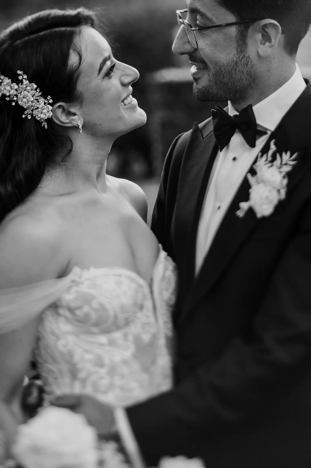 Bride and groom looking at each other