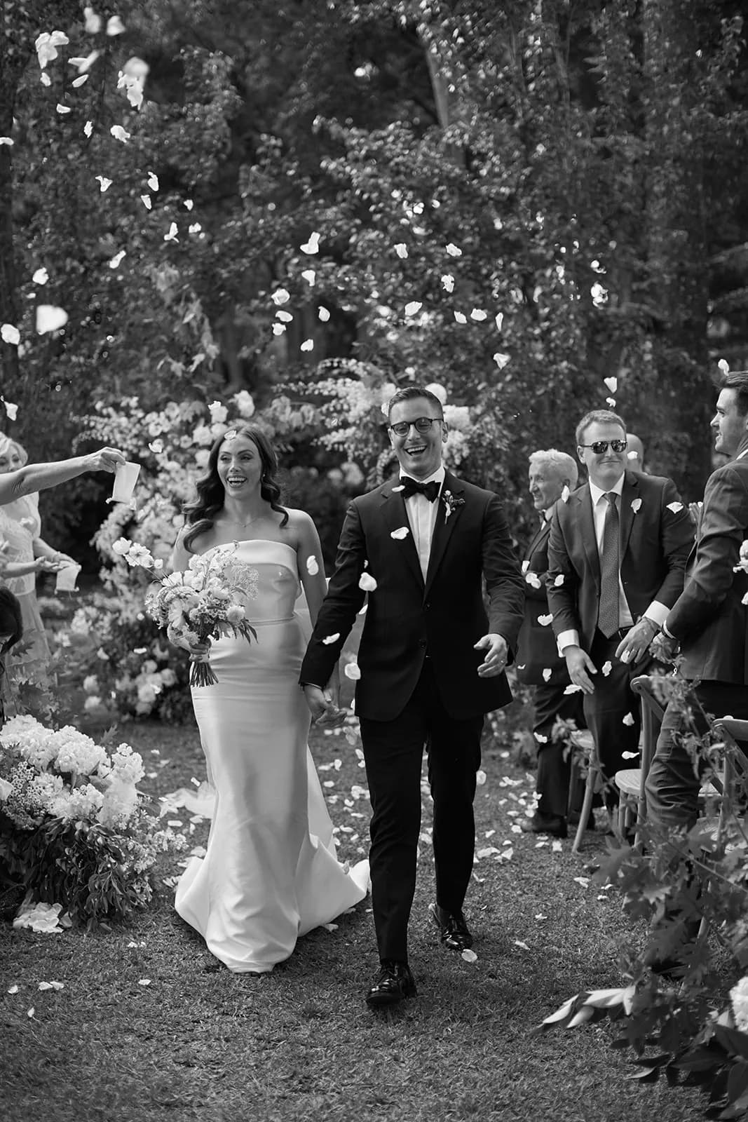 Bride and groom walking down the aisle