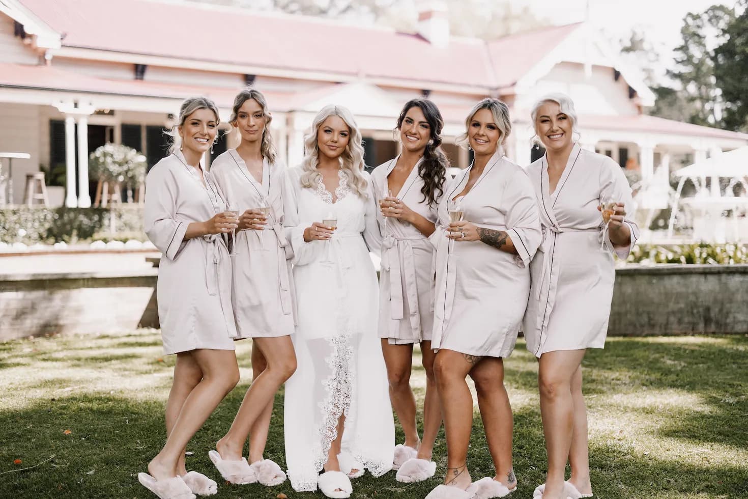 Bride and bridesmaids getting ready