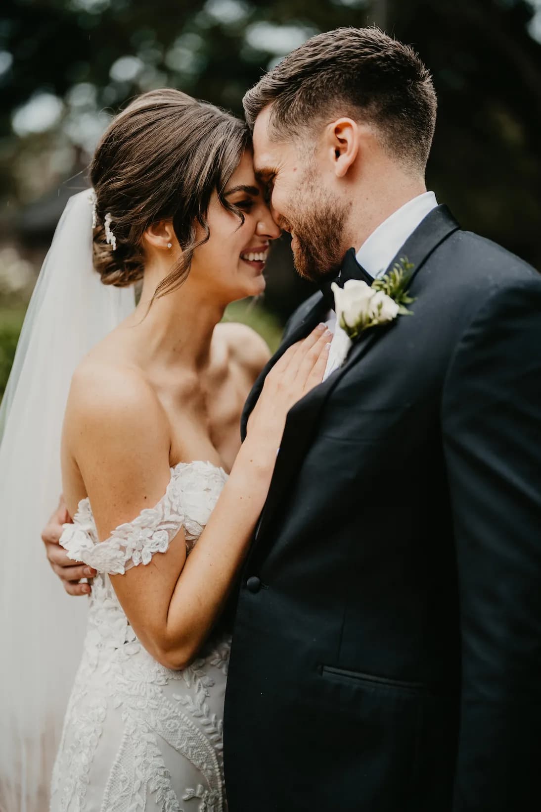 Bride and groom hugging