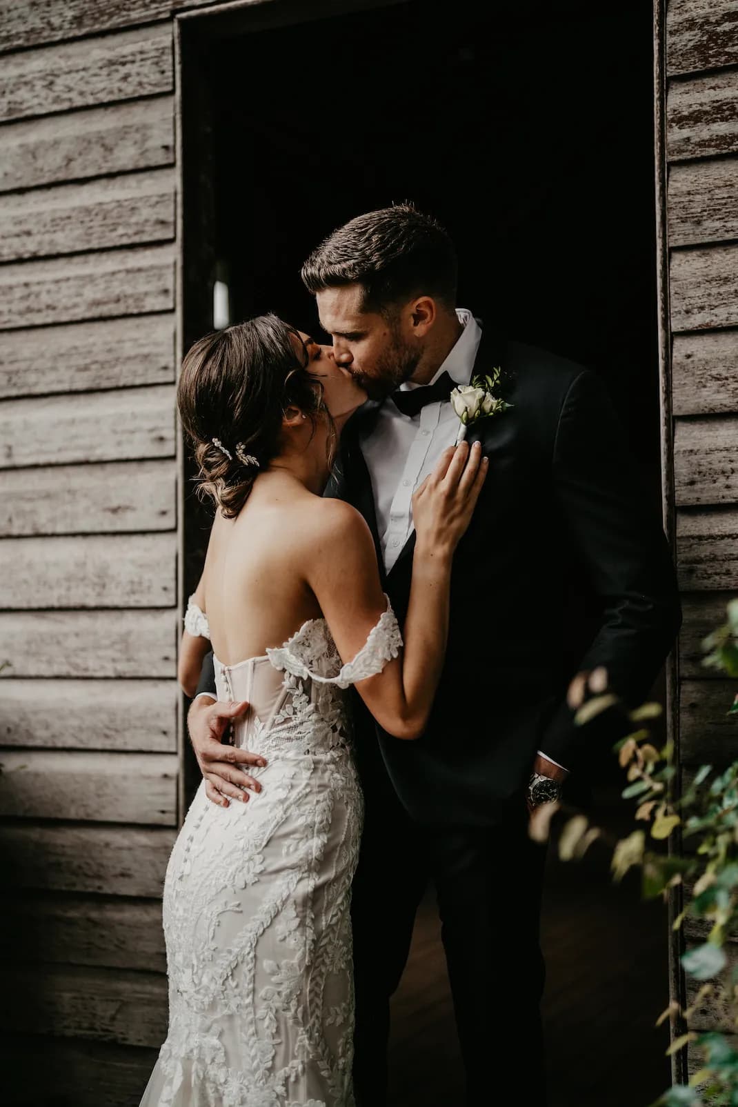Bride and groom kissing